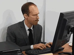 A man multitasking at work 
